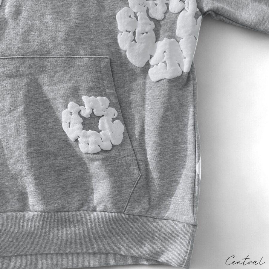 Gray Central ae hoodie featuring a cotton wreath design on the front, displayed on a neutral background.