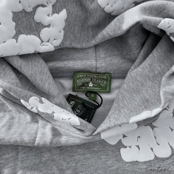 Gray Central ae hoodie featuring a cotton wreath design on the front, displayed on a neutral background.