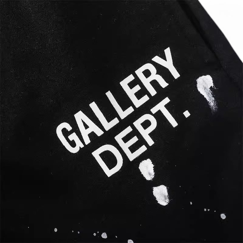 Central ae Gallery Dept paint splatter shorts featuring a vibrant, artistic design and relaxed fit for casual wear.