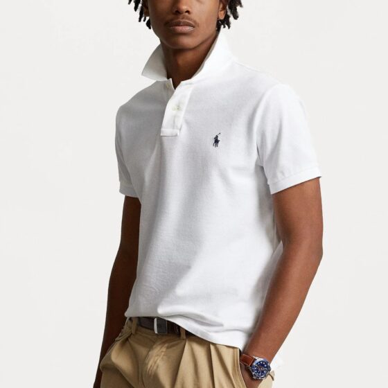 Men's Ralph Lauren white polo shirt displayed on a hanger, featuring the signature logo and classic collar design.