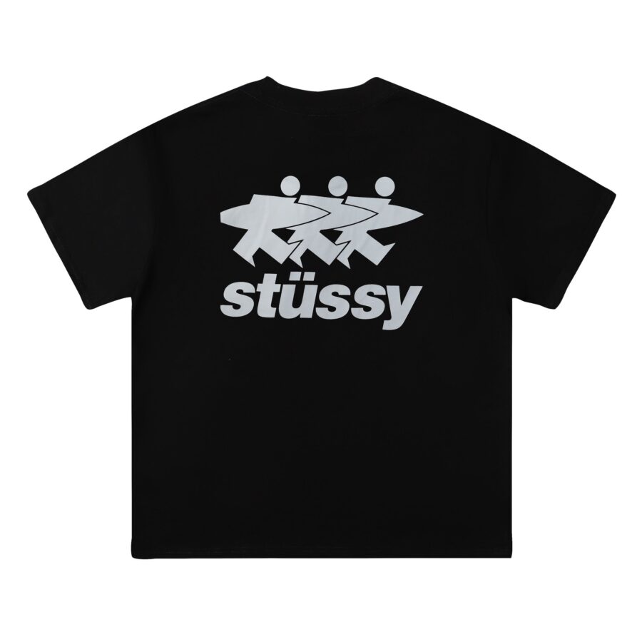 Black Stussy SURFWALK t-shirt featuring a bold graphic design, displayed on a flat surface.