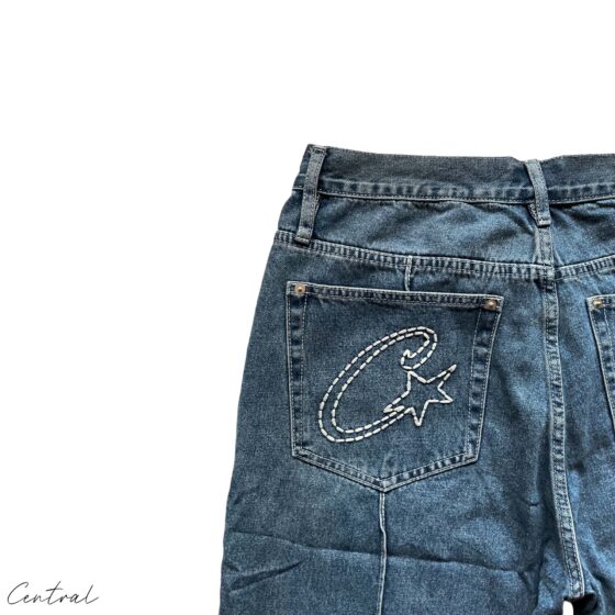 Corteiz C-Star Denim Shorts in a casual style, featuring a classic cut and distressed detailing, perfect for summer wear.