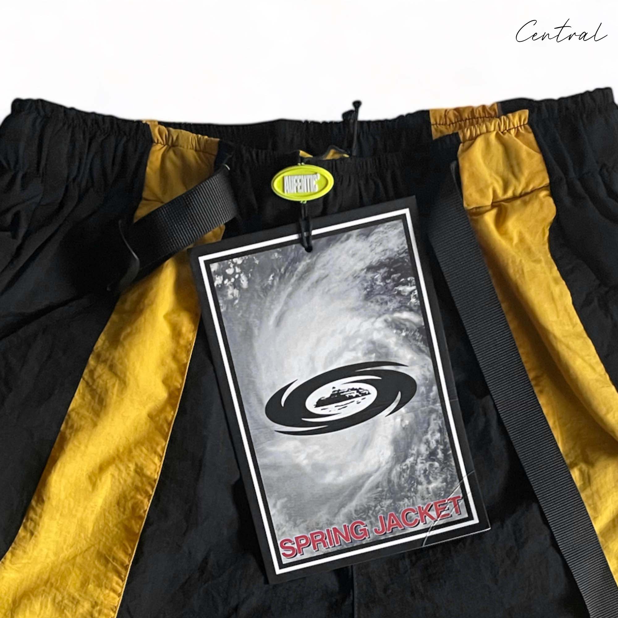 Black and yellow Corteiz shorts from Central ae, featuring a comfortable fit and stylish design.