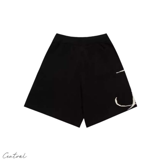 Black and creme Rhude knit logo shorts with a comfortable fit and stylish design, perfect for casual wear.