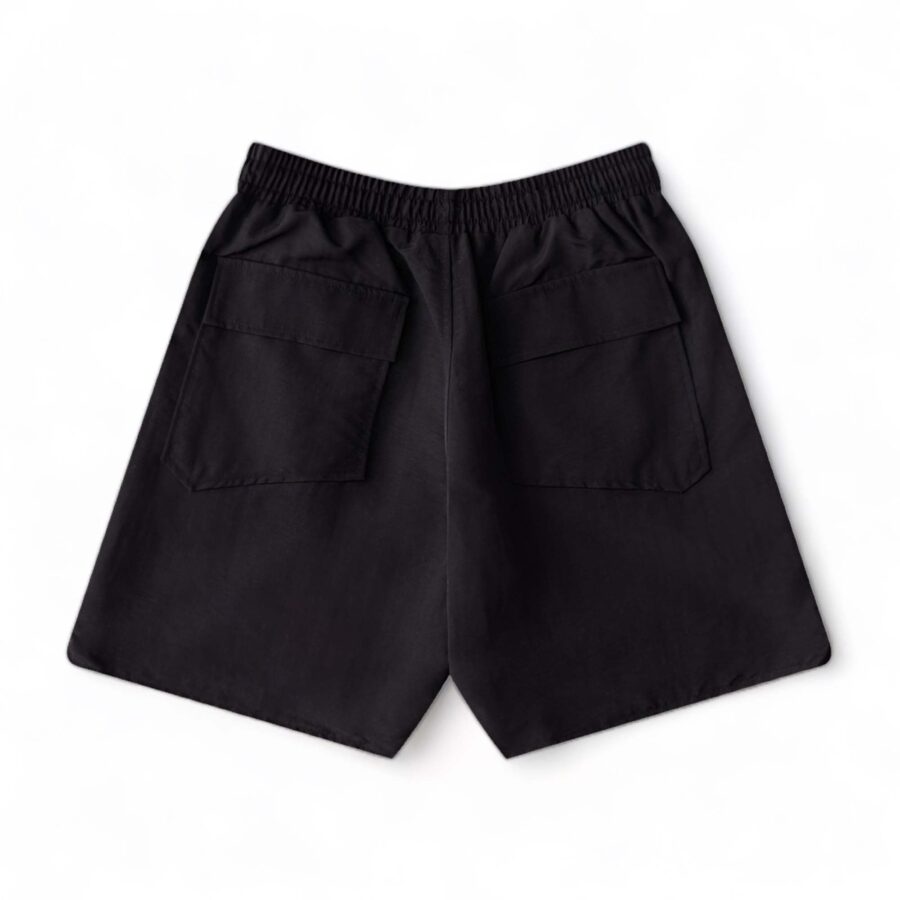 Rhude black shorts displayed on a neutral background, showcasing the relaxed fit and stylish design details.