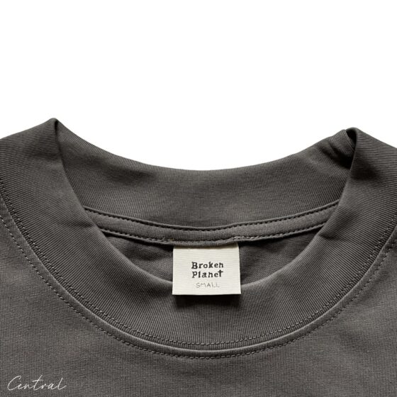 Central ae Broken Planet Out of the Shadows t-shirt featuring a bold graphic design on a soft, casual fabric.