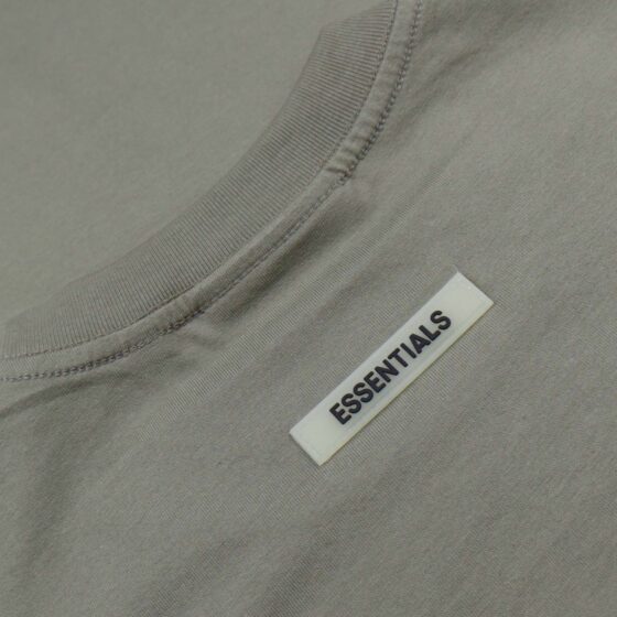 Olive green oversized FOG Essentials t-shirt with a relaxed fit and soft fabric.
