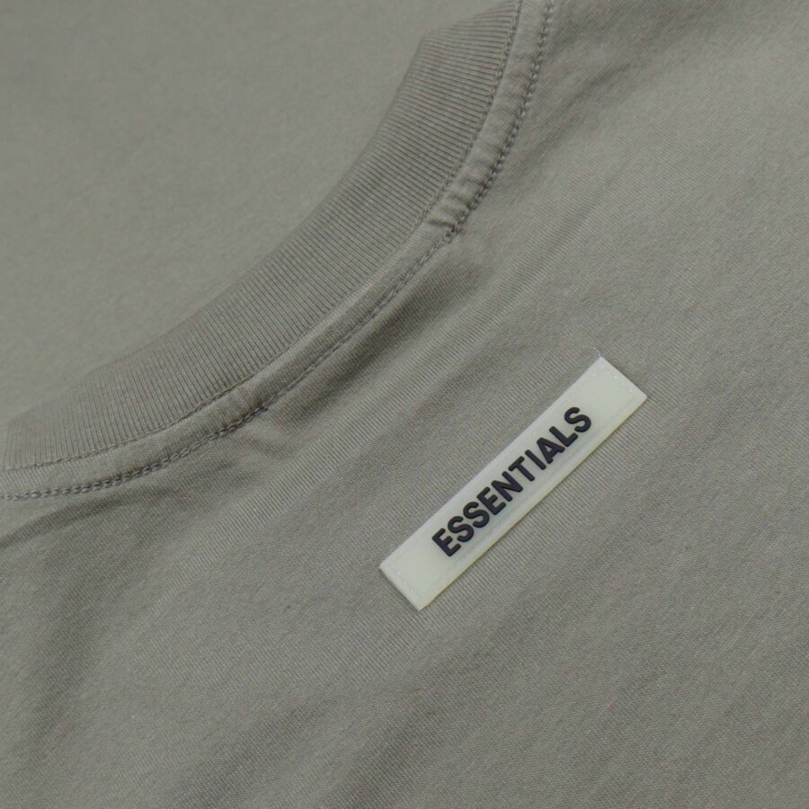 Olive green oversized FOG Essentials t-shirt with a relaxed fit and soft fabric.