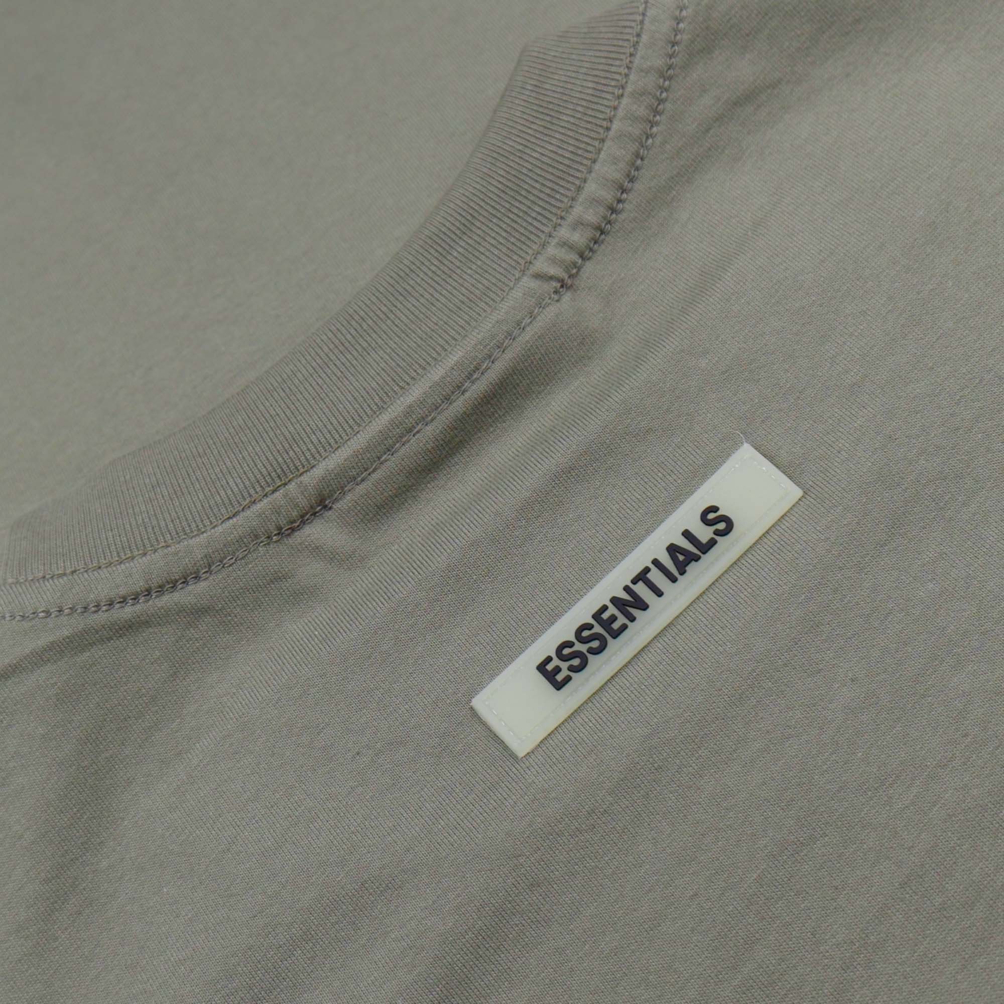 Olive green oversized FOG Essentials t-shirt with a relaxed fit and soft fabric.
