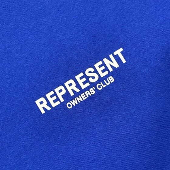 Cobalt blue REPRESENT OWNERS CLUB T-shirt featuring a classic crew neckline and short sleeves.