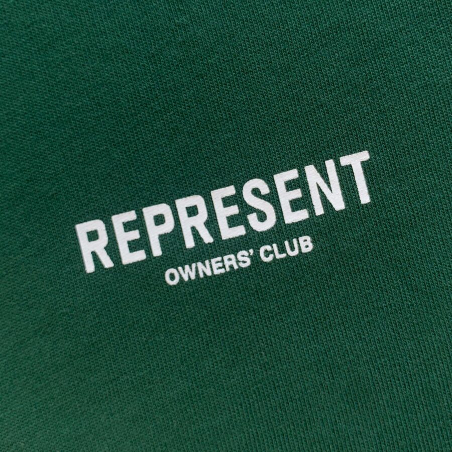 Racing Green REPRESENT OWNERS CLUB T-shirt featuring a classic fit and logo on soft cotton fabric.