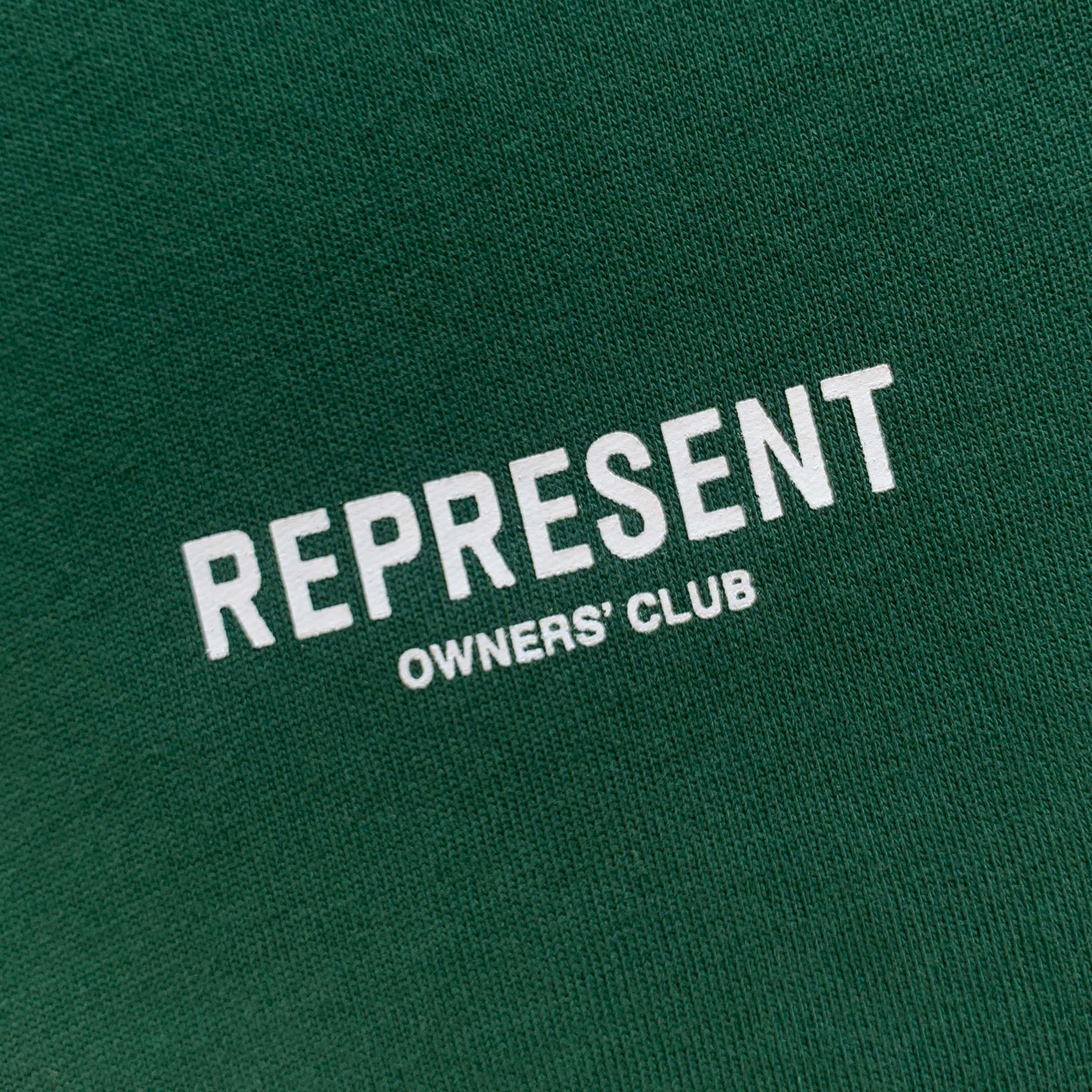 Racing Green REPRESENT OWNERS CLUB T-shirt featuring a classic fit and logo on soft cotton fabric.