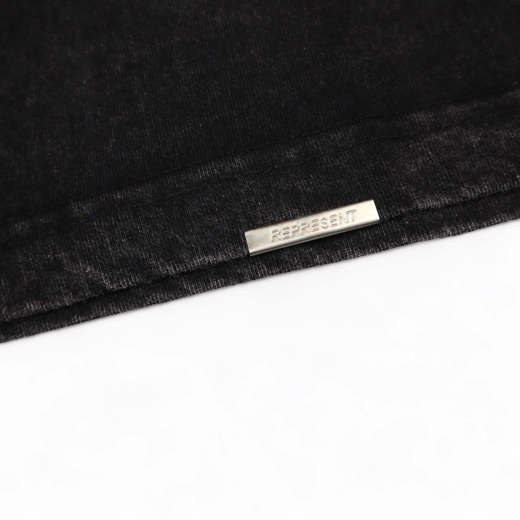 Faded tee featuring 'The Spirit Untamed' graphic design by Central, showcasing a relaxed fit and soft fabric texture.