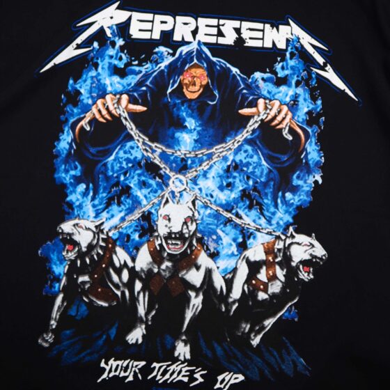 Black Represent 'Your Tute's Up' t-shirt displayed on a flat surface, showcasing bold graphic design and casual style.