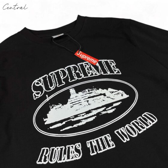 Sup Corteiz Rules The World Tee in black, featuring bold graphic text on a casual short-sleeve t-shirt by central ae.