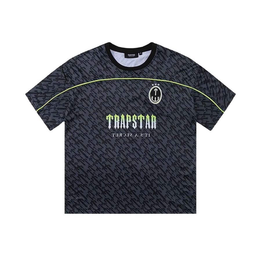 Black and lime Trapstar monogram jersey t-shirt featuring bold logo design and comfortable fit.