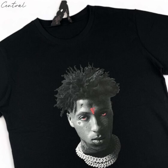Vlone x NBA YoungBoy black T-shirt featuring bold graphic print and relaxed fit, perfect for streetwear enthusiasts.