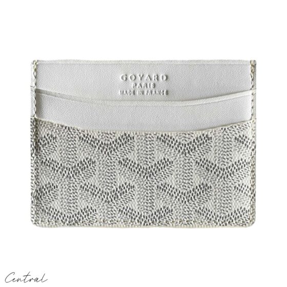 White Goyard card holder wallet from Central ae, featuring a sleek design and iconic logo pattern.