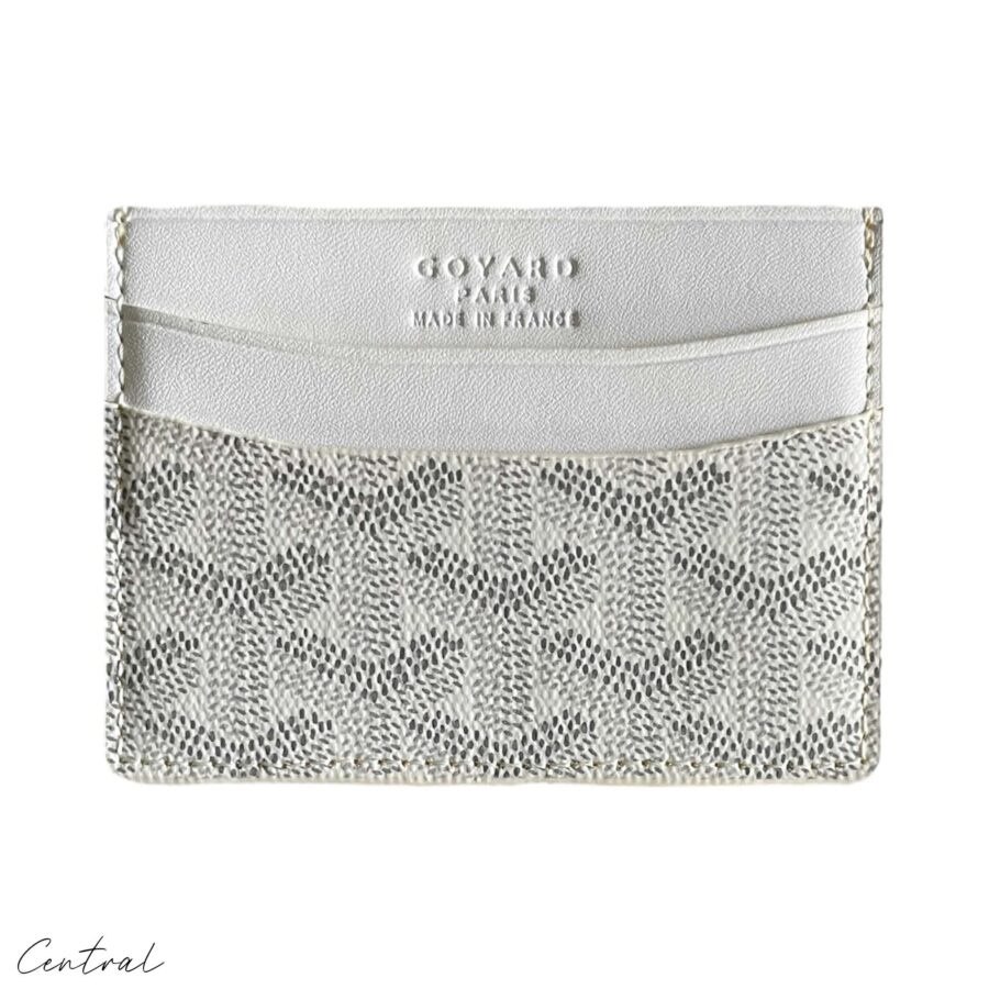 White Goyard card holder wallet from Central ae, featuring a sleek design and iconic logo pattern.