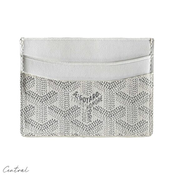 Goyard white card holder wallet featuring signature pattern and slim design for easy carrying.