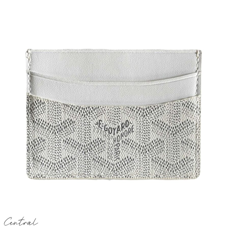 Goyard white card holder wallet featuring signature pattern and slim design for easy carrying.