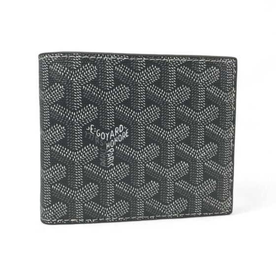 Gray Goyard wallet by Central ae featuring a sleek design and signature pattern, displayed against a neutral background.
