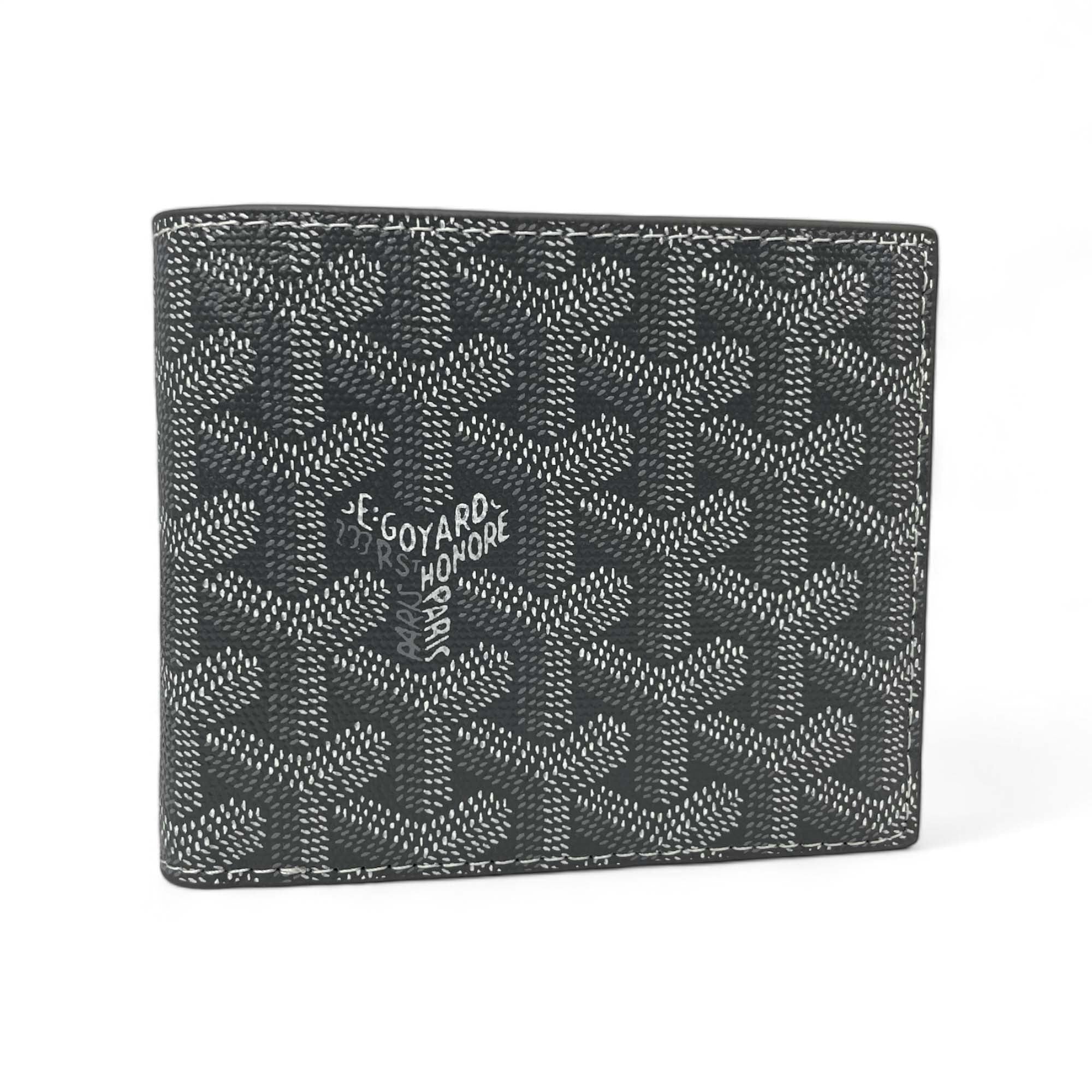 Gray Goyard wallet by Central ae featuring a sleek design and signature pattern, displayed against a neutral background.