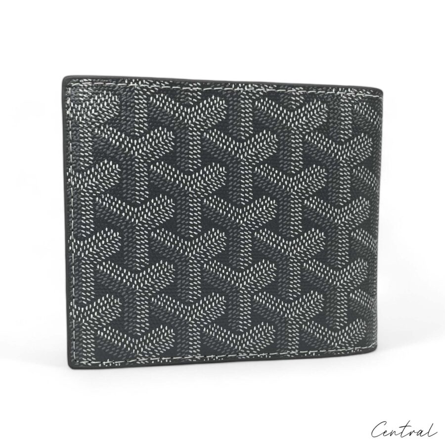 Gray Goyard wallet by Central ae with a sleek design and signature pattern showcased on a white background.