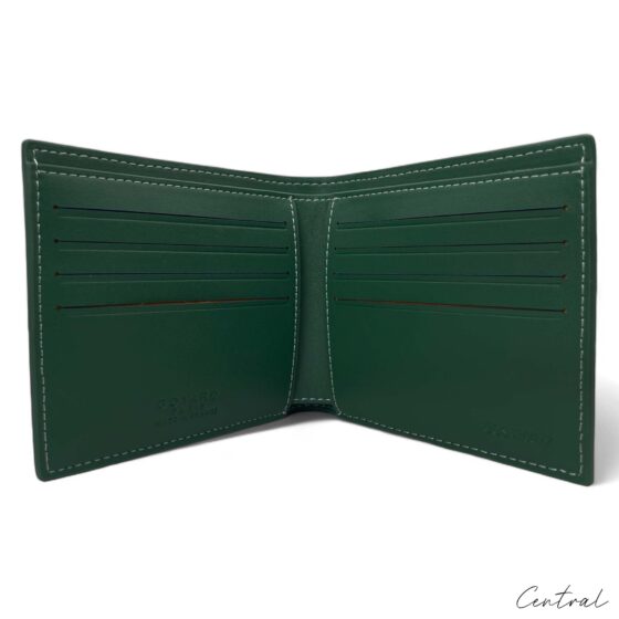 Green Goyard wallet by Central ae with signature pattern and sleek design, showcasing the brand's luxury craftsmanship.