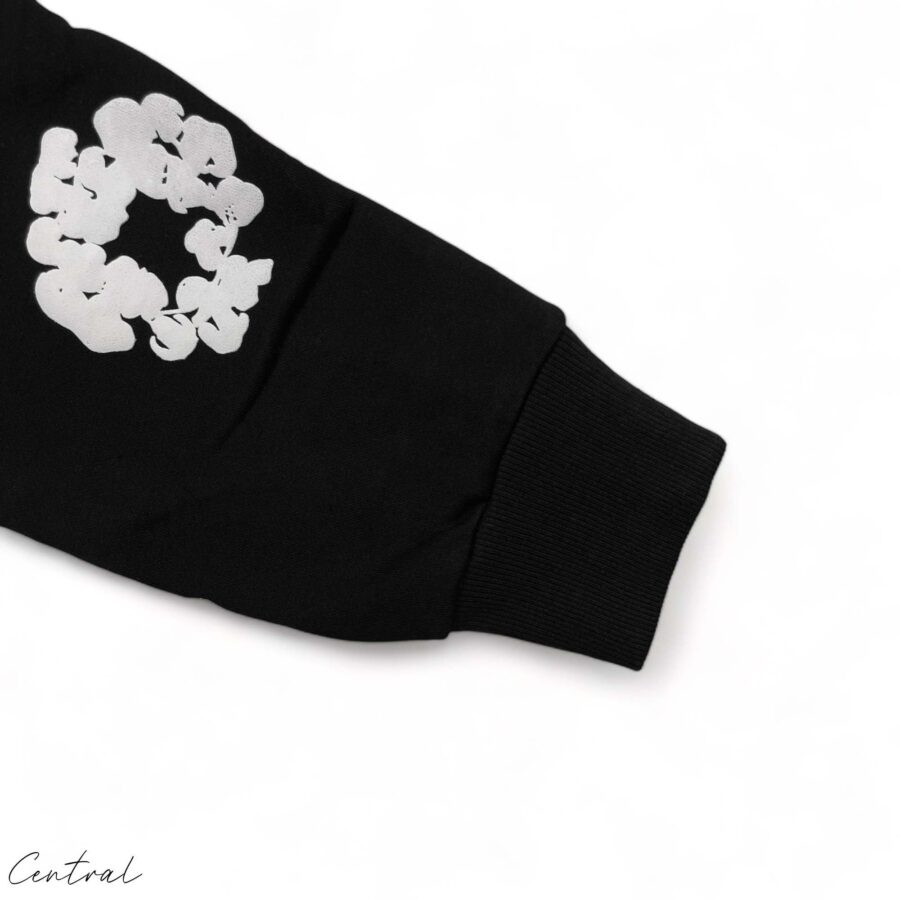Black READYMADE x DENIM TEARS hoodie featuring a relaxed fit and unique graphic design by Central.