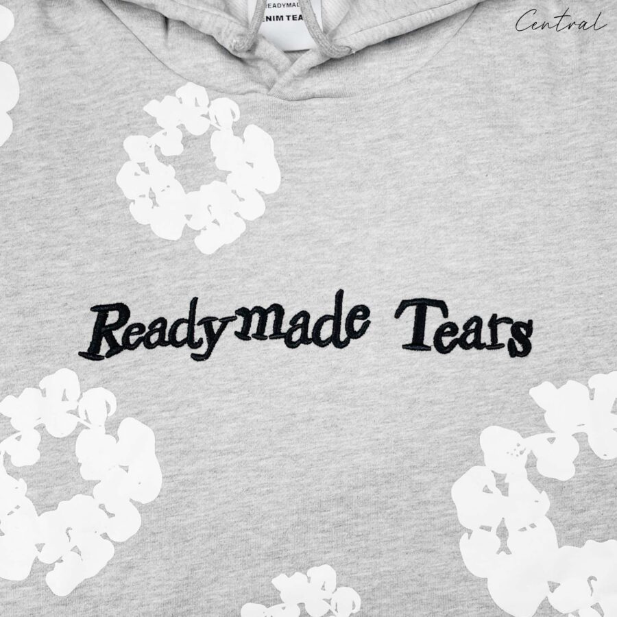 Gray READYMADE x DENIM TEARS hoodie featuring a relaxed fit and logo details from the Central brand.