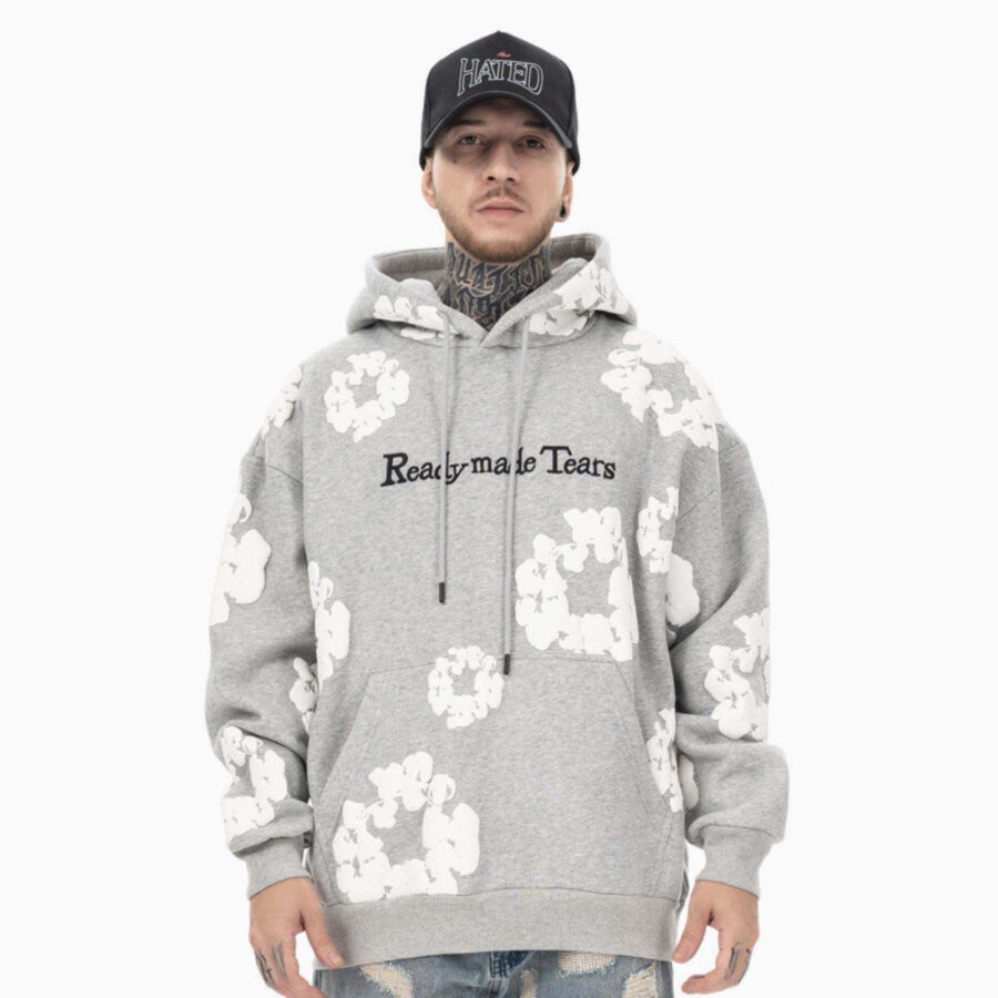Gray READYMADE x DENIM TEARS hoodie featuring a relaxed fit and unique design details by central.