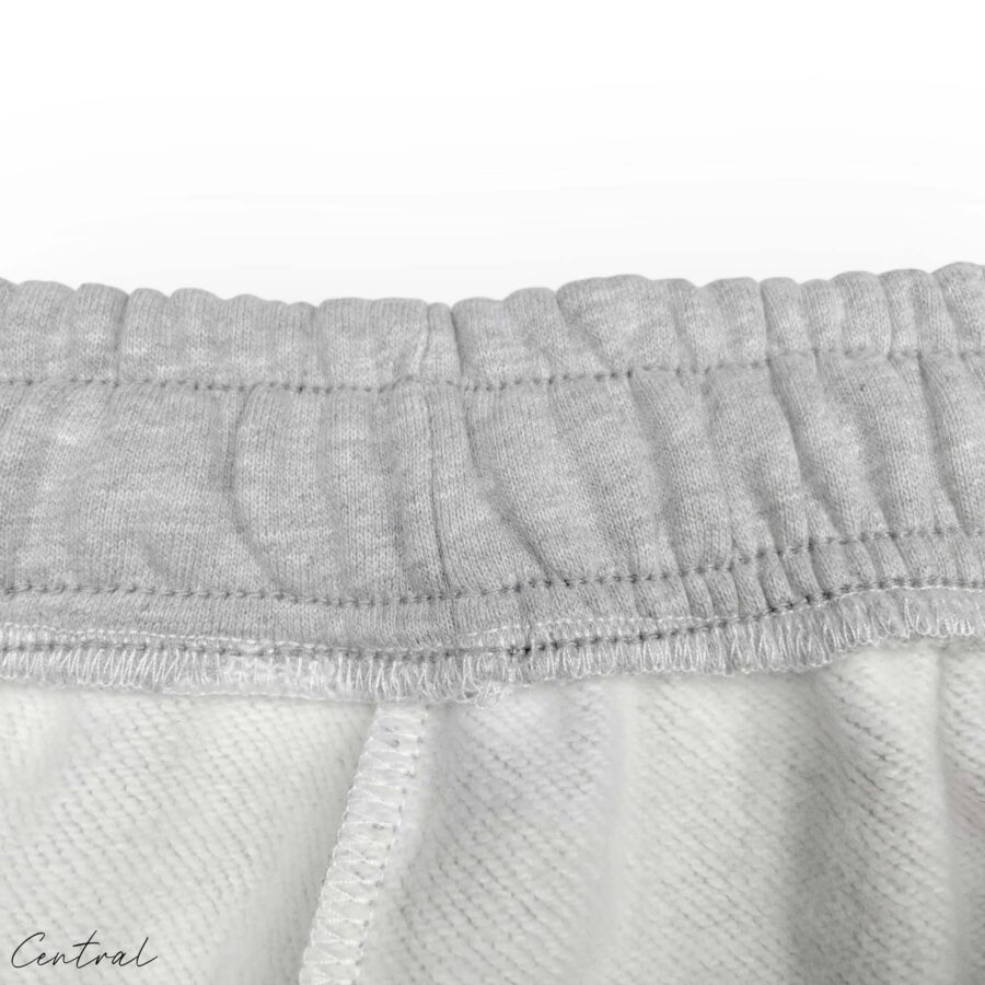Gray READYMADE x DENIM TEARS sweatpants featuring a relaxed fit and logo details by central.