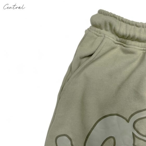 Green Syna World short set featuring a matching T-shirt and shorts by Central, displayed on a neutral background.