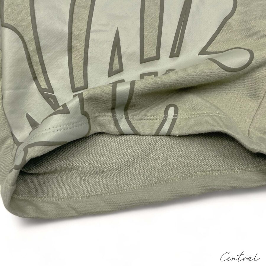 Central Syna World short set in green featuring a matching t-shirt and shorts, displayed on a neutral background.