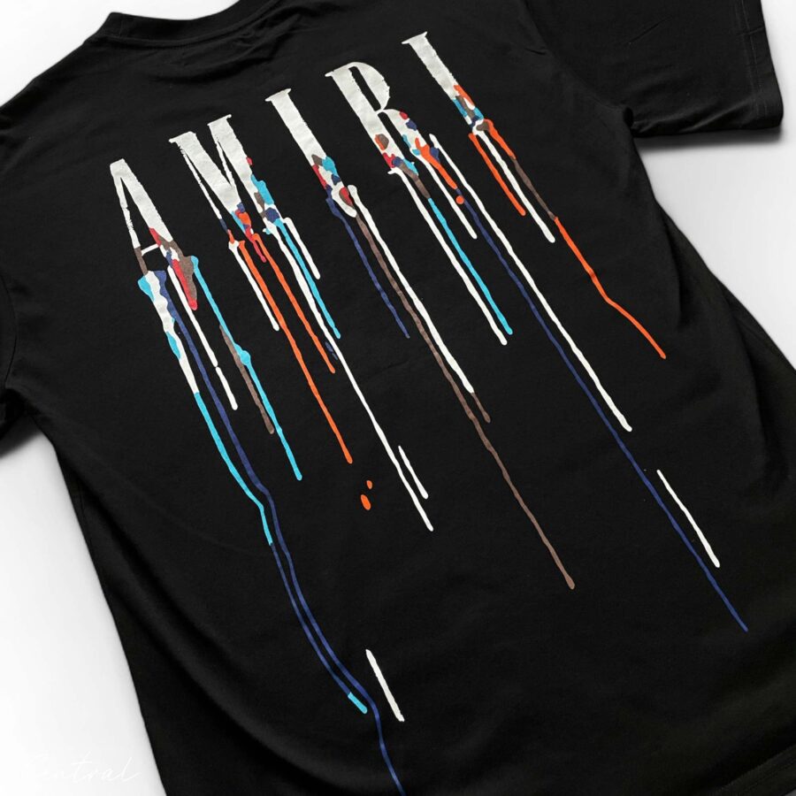 Amiri Paint Drip Black T-Shirt featuring a stylish drip design on a classic black tee.