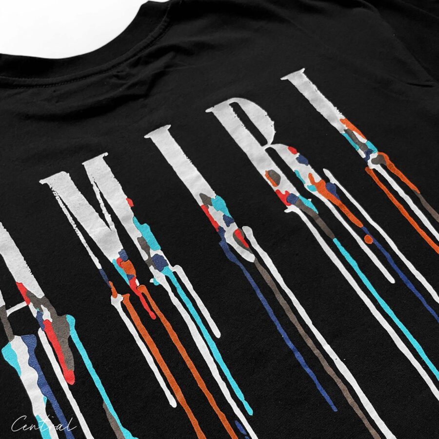 Black Amiri Paint Drip T-Shirt featuring a unique paint drip design on soft cotton fabric.
