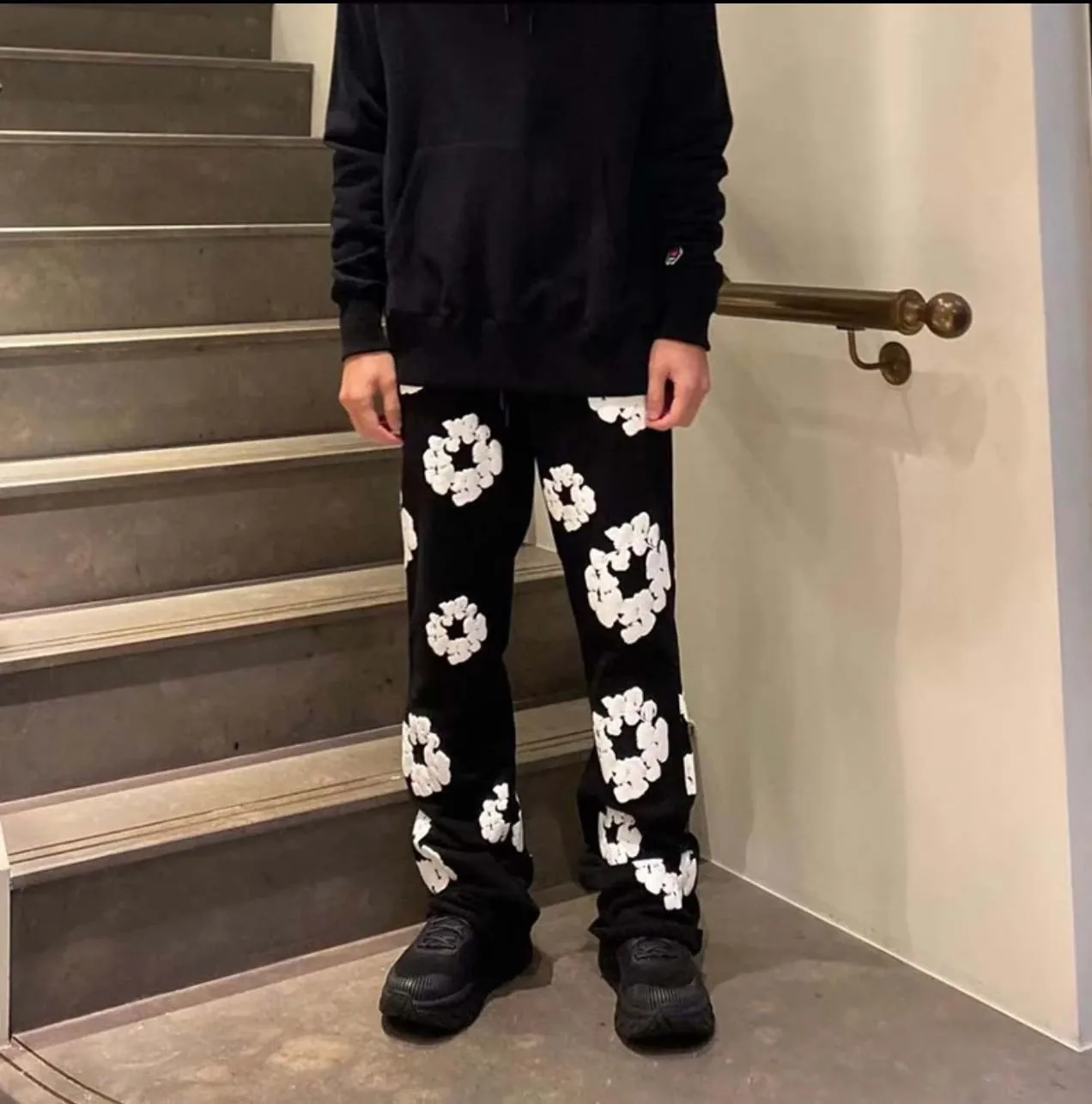 DENIM TEARS THE COTTON WREATH SWEATPANTS BLACK